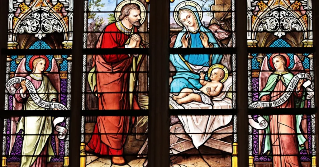 Stained glass of Mary, Joseph, baby Jesus, and angels — unisex baby names gift from God